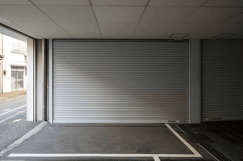 What should I do in case of an emergency garage door problem